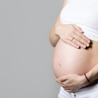 pregnant woman touching her belly 1 320x320 1-grupofarmadelecuador