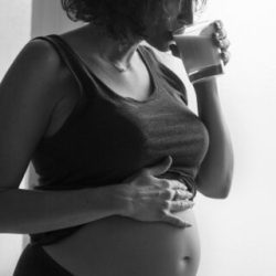 Pregnant woman drinking milk